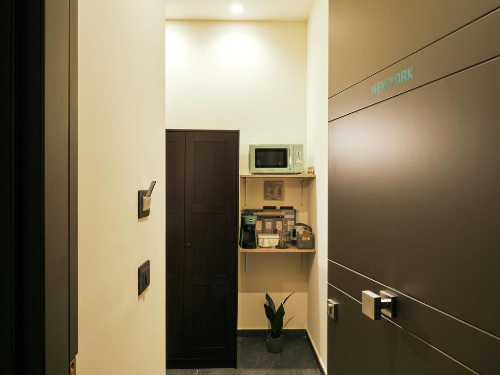 Kuchyň nebo kuchyňský kout v ubytování HUB Rooms