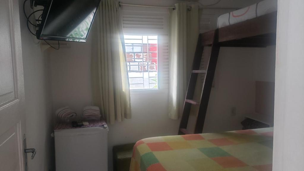 Postel nebo postele na pokoji v ubytování Pousada e Hostel Sol e Mar