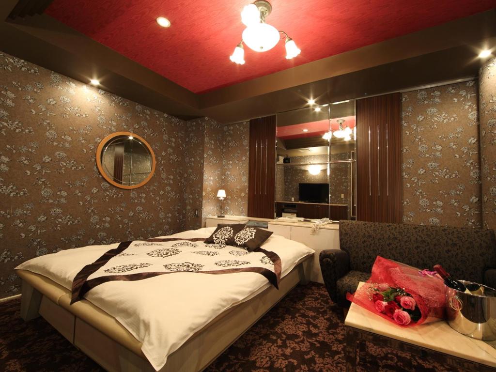 Postel nebo postele na pokoji v ubytování Hotel La Siesta (Adult Only)