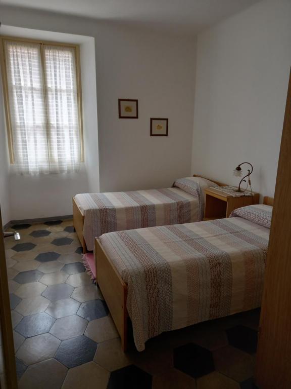Postel nebo postele na pokoji v ubytování Casa MAX