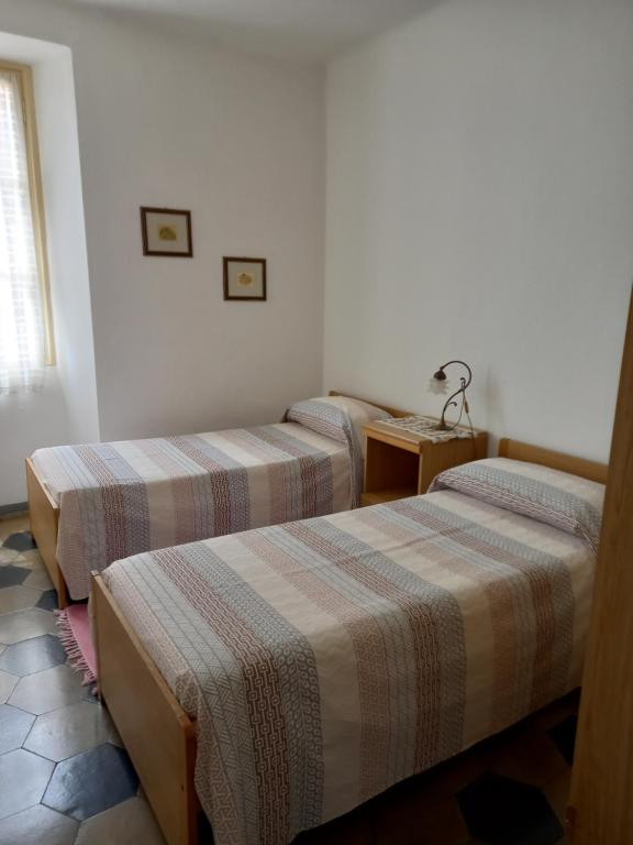Postel nebo postele na pokoji v ubytování Casa MAX
