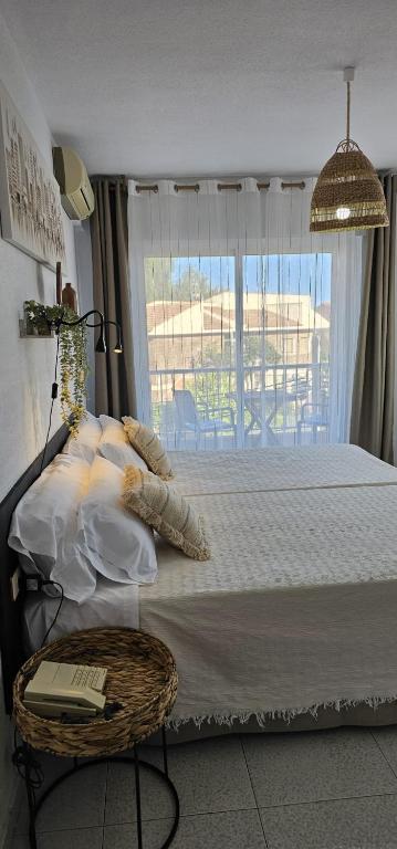 Postel nebo postele na pokoji v ubytování LOS NAREJOS Hotel