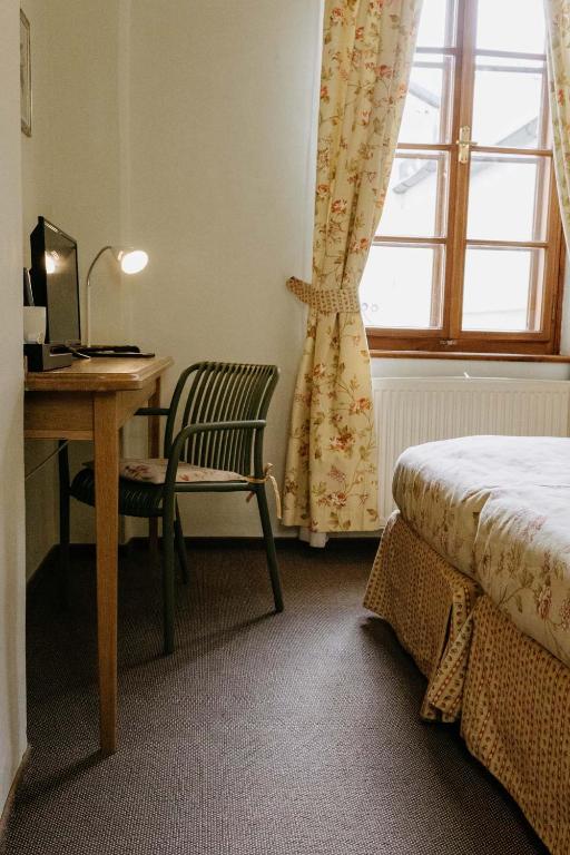 Postel nebo postele na pokoji v ubytování Penzion Telč No. 20