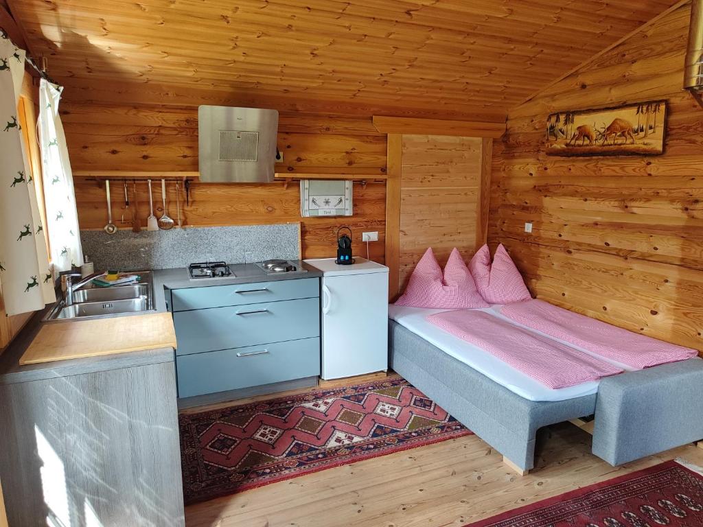 Kuchyň nebo kuchyňský kout v ubytování Harrys Blockhütte