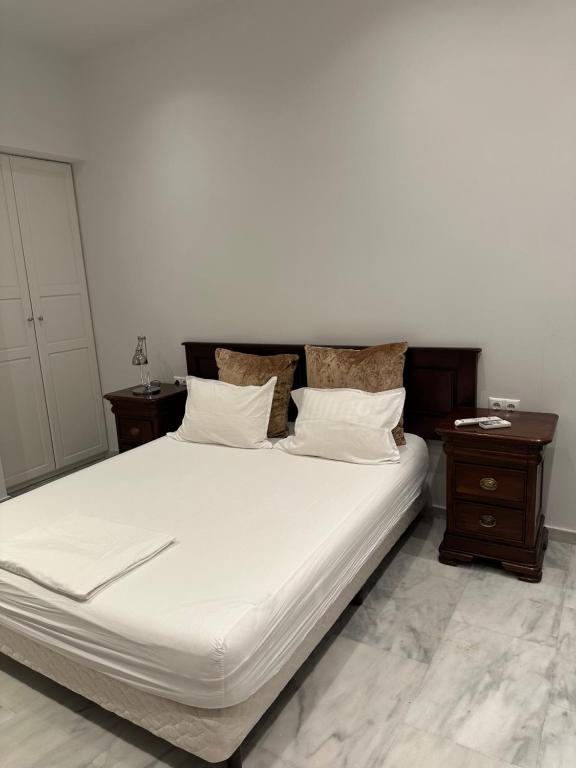 Posteľ alebo postele v izbe v ubytovaní Palace Apartment
