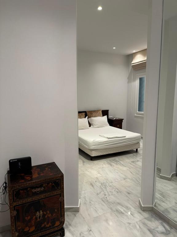 Posteľ alebo postele v izbe v ubytovaní Palace Apartment