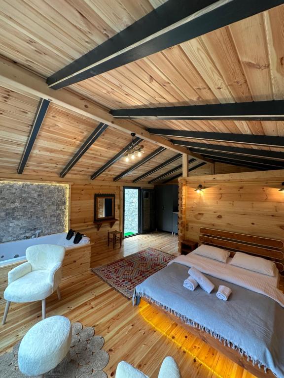 Postel nebo postele na pokoji v ubytování Nayon Bungalov