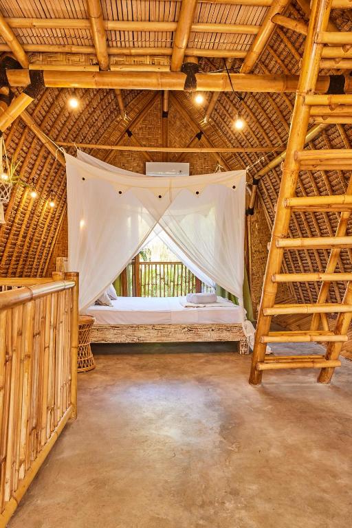 Postel nebo postele na pokoji v ubytování 360 Surf Camp