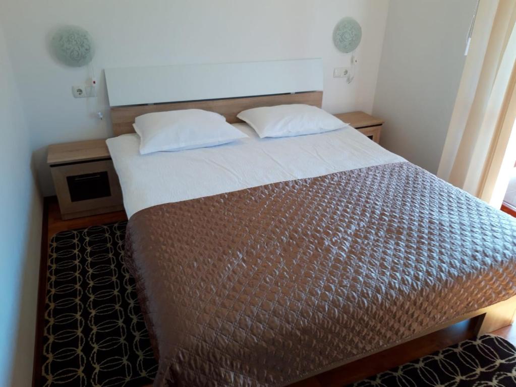 Postel nebo postele na pokoji v ubytování CASA Dana
