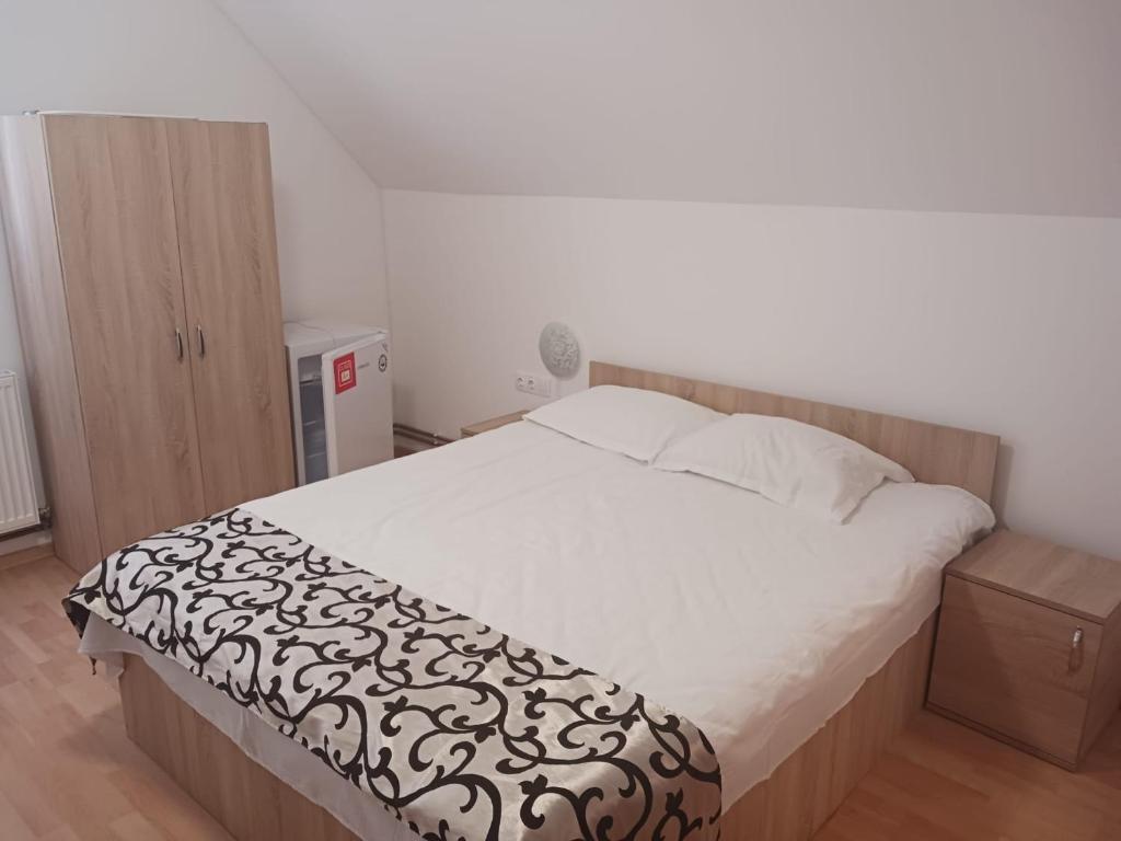 Postel nebo postele na pokoji v ubytování CASA Dana