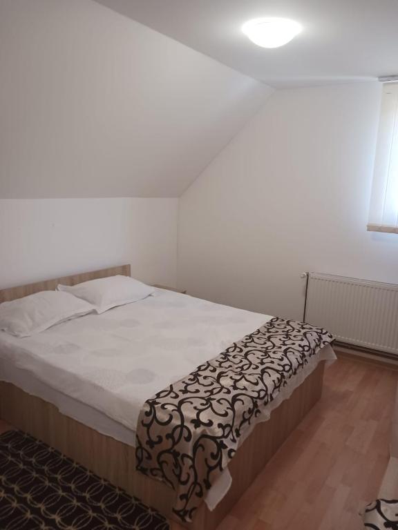 Postel nebo postele na pokoji v ubytování CASA Dana