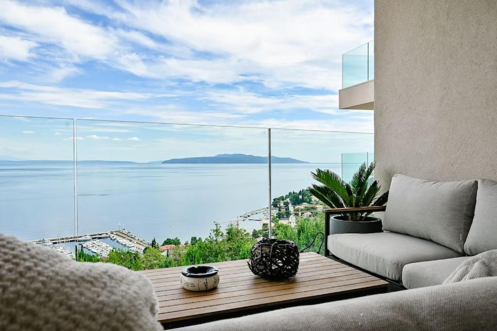 a living room with a view of the ocean at Appartement Carpe Diem in Ičići