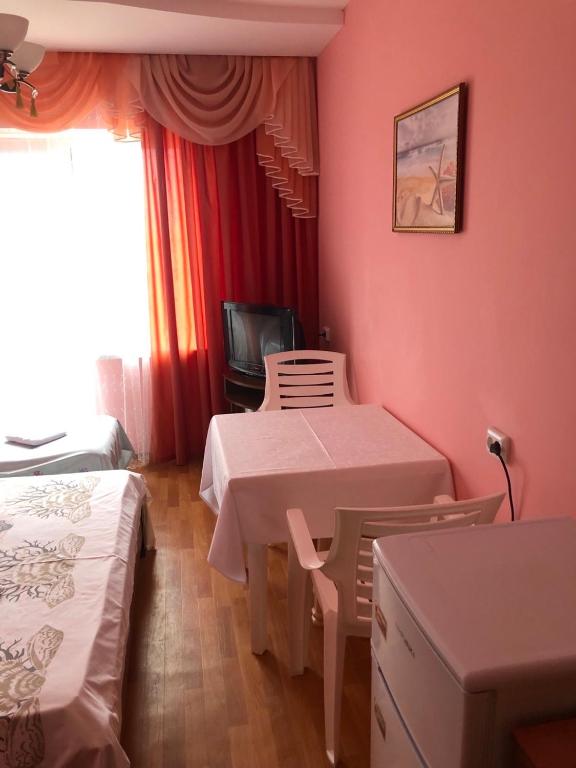 Postel nebo postele na pokoji v ubytování AVRORA