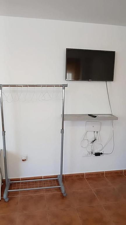 Televízia a/alebo spoločenská miestnosť v ubytovaní Loft 1 Nuevo primer piso sin ascensor,wifi