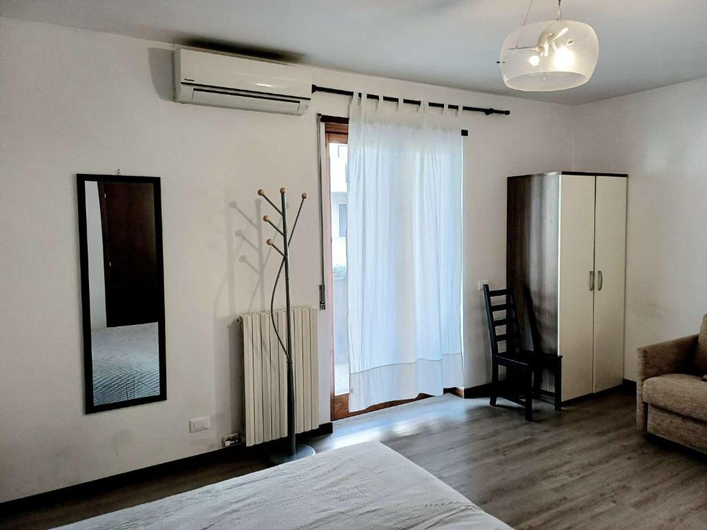 Postel nebo postele na pokoji v ubytování Nottetempo Verona