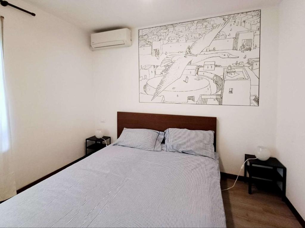 Postel nebo postele na pokoji v ubytování Nottetempo Verona