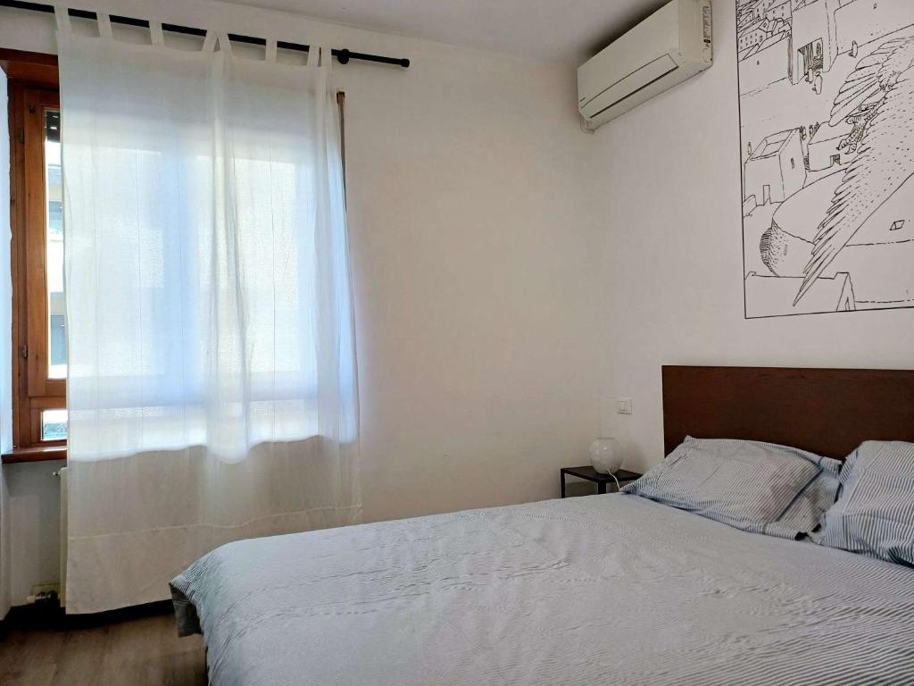 Postel nebo postele na pokoji v ubytování Nottetempo Verona