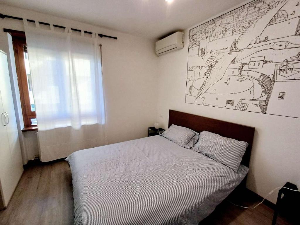 Postel nebo postele na pokoji v ubytování Nottetempo Verona