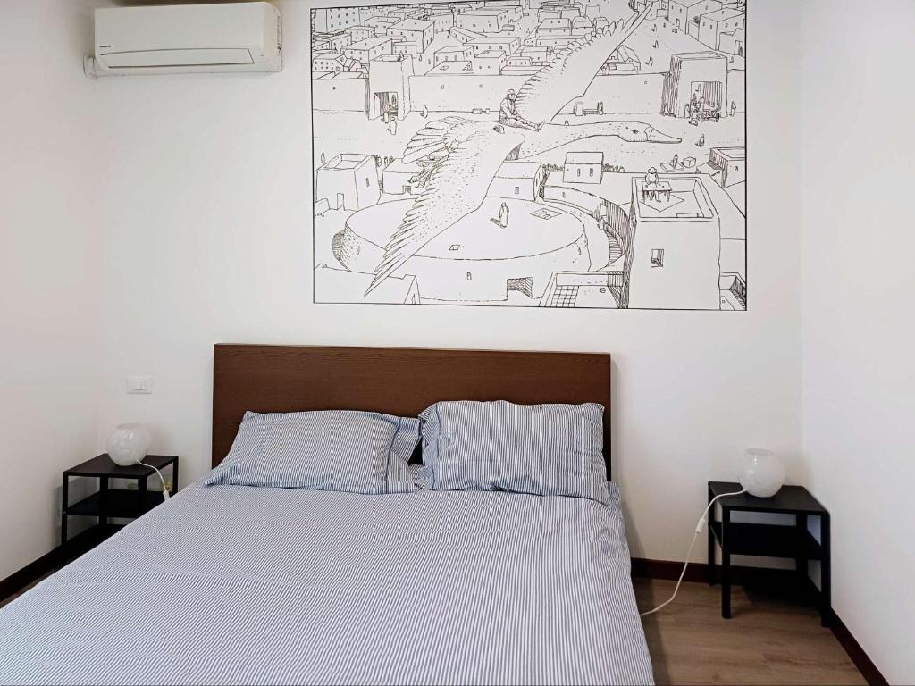 Postel nebo postele na pokoji v ubytování Nottetempo Verona