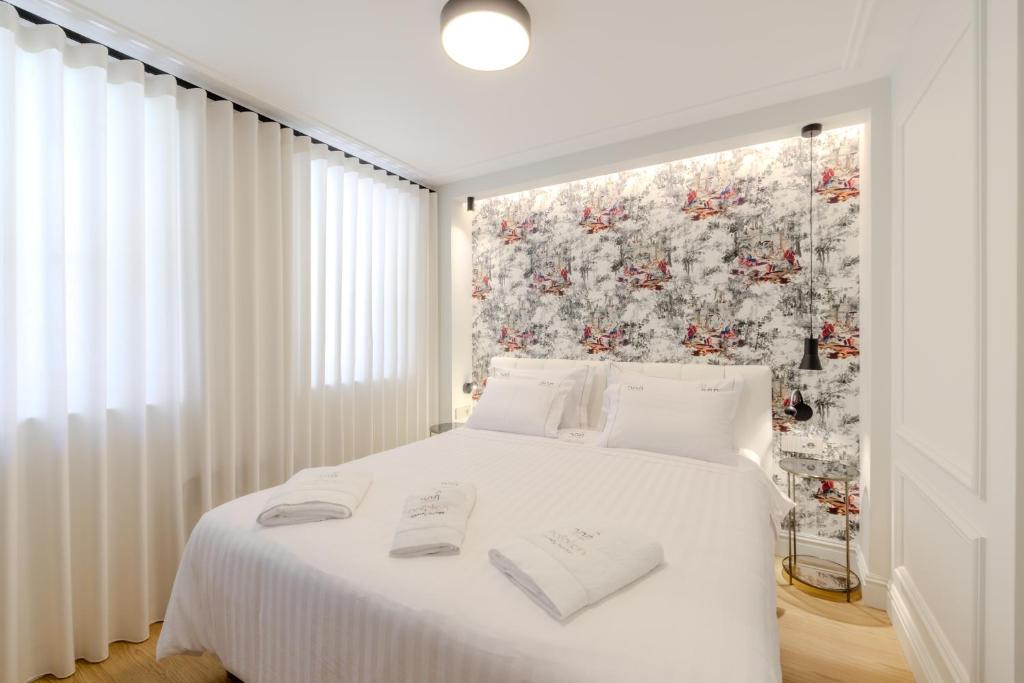 Postel nebo postele na pokoji v ubytování Nafplion Comfy Suites