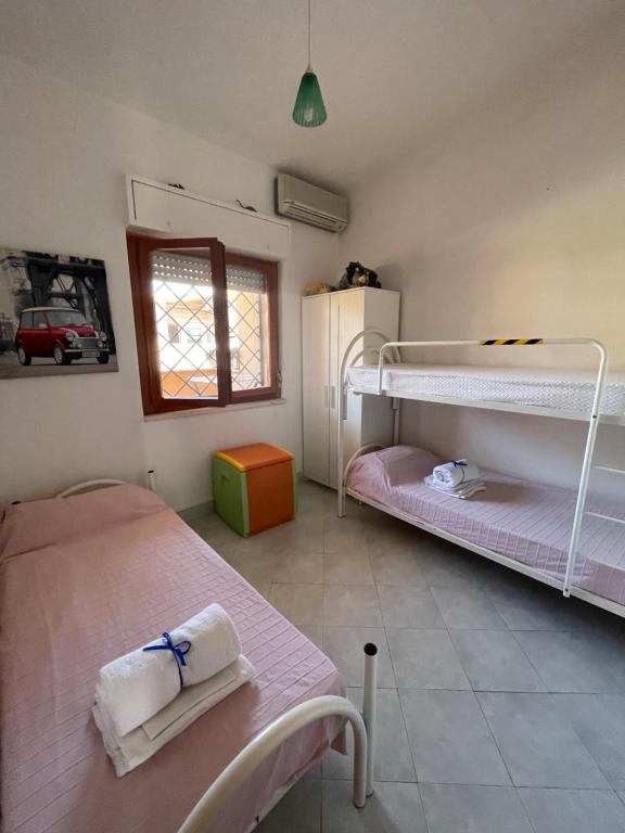 Postel nebo postele na pokoji v ubytování House Turi