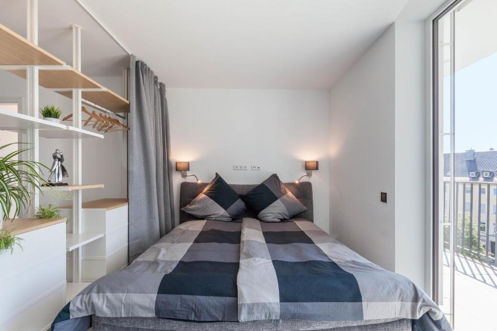 Postel nebo postele na pokoji v ubytování Modern, Cityview, Penthouse Yiwoo
