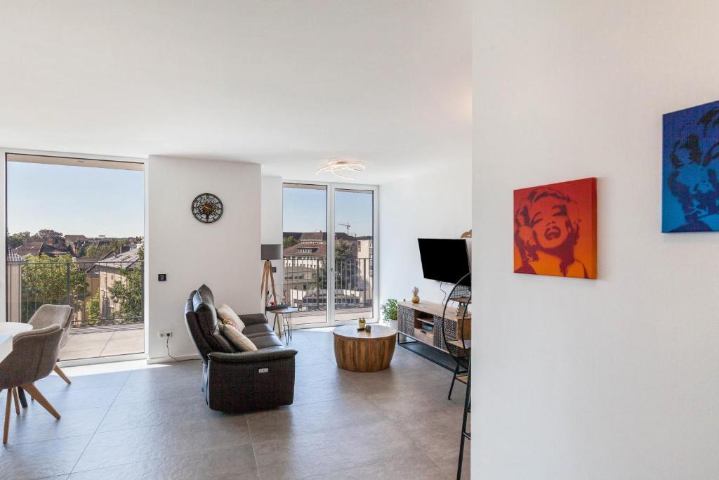 TV a/nebo společenská místnost v ubytování Modern, Cityview, Penthouse Yiwoo