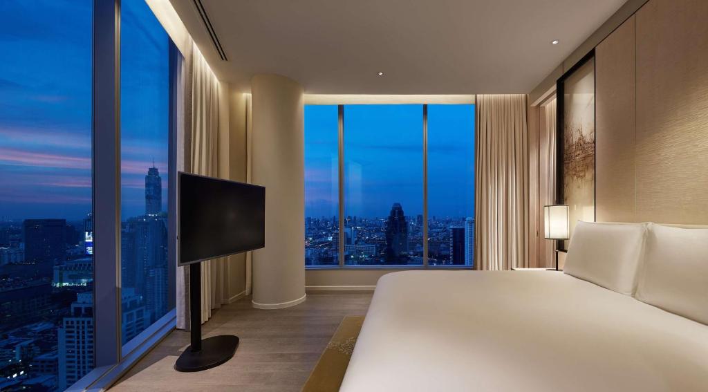 Postel nebo postele na pokoji v ubytování Park Hyatt Bangkok