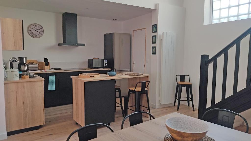 Kuchyň nebo kuchyňský kout v ubytování Duplex lumineux et calme en centre-ville