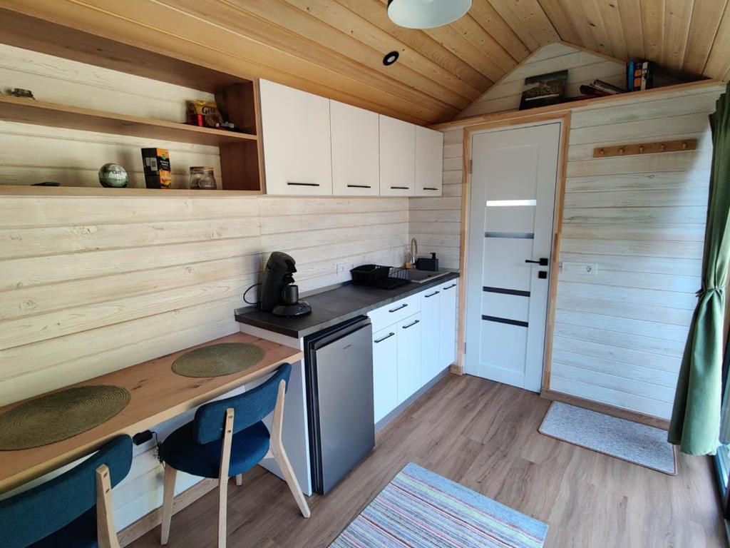 Kuchyň nebo kuchyňský kout v ubytování Transfăgărășan River Retreat