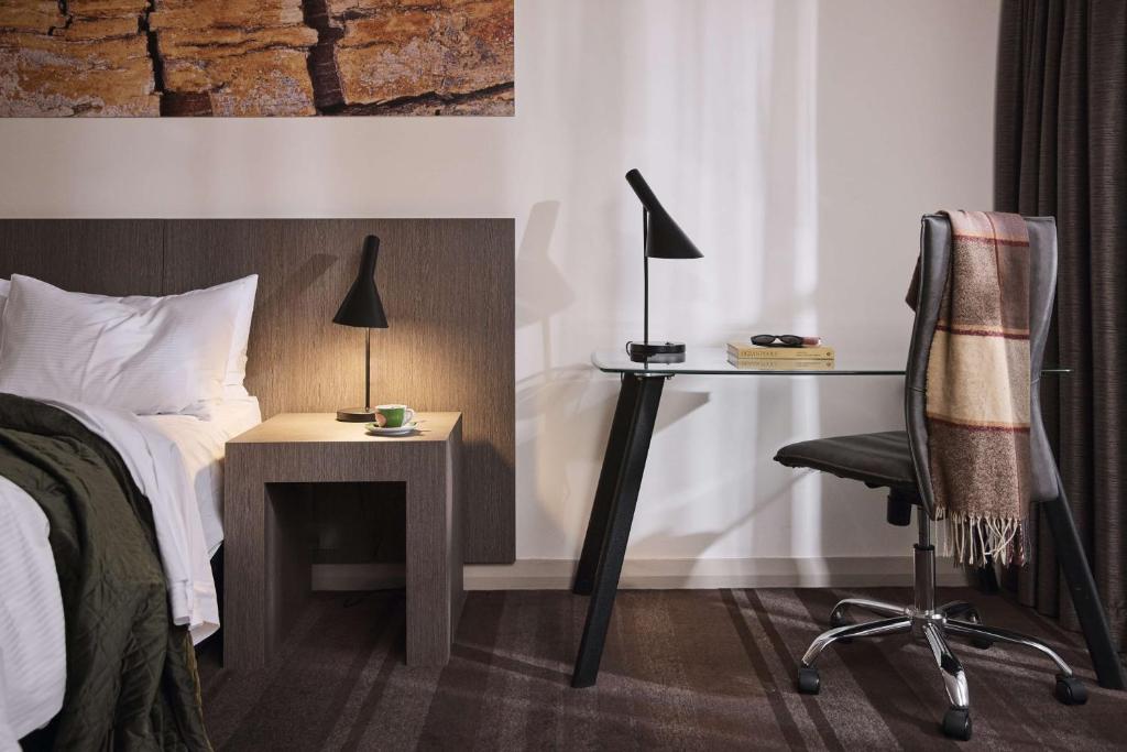 Postel nebo postele na pokoji v ubytování Rydges World Square