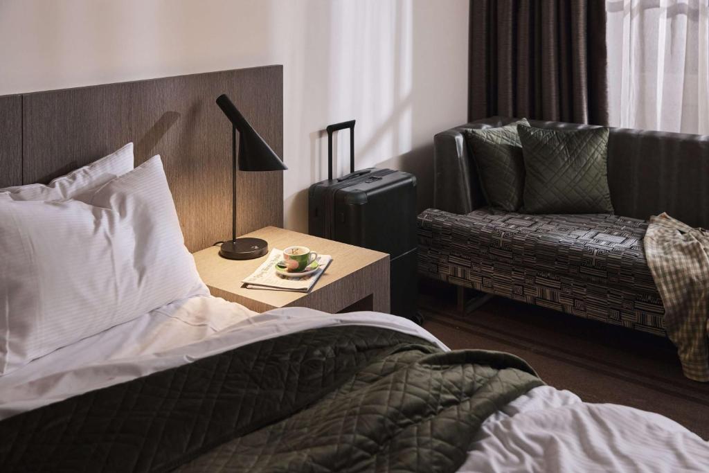 Postel nebo postele na pokoji v ubytování Rydges World Square