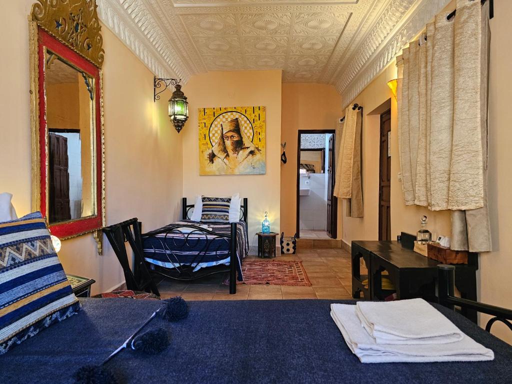 Postel nebo postele na pokoji v ubytování Riad Dar Rita