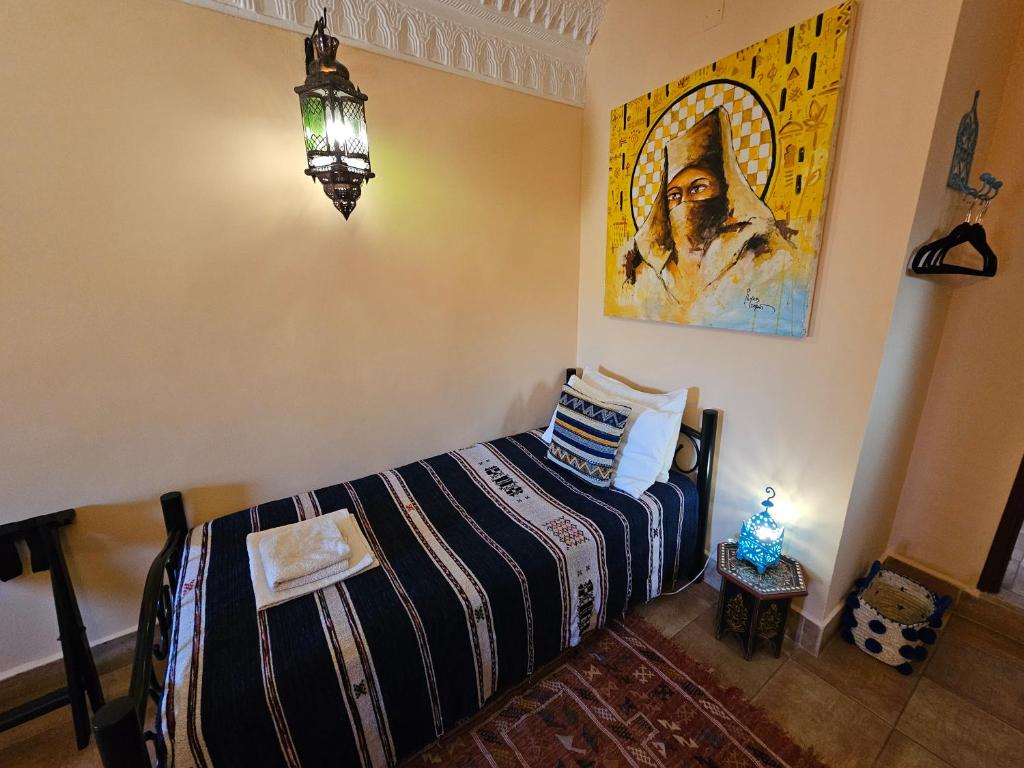 Postel nebo postele na pokoji v ubytování Riad Dar Rita