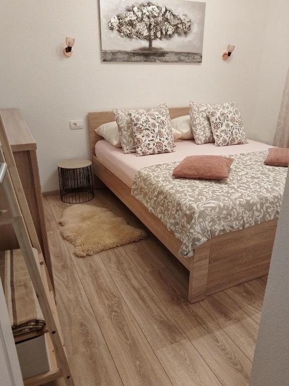 Postel nebo postele na pokoji v ubytování Apartments Hasanovic Rukavac