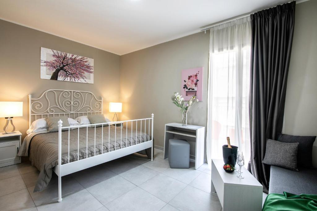 Postel nebo postele na pokoji v ubytování Hotel Noah