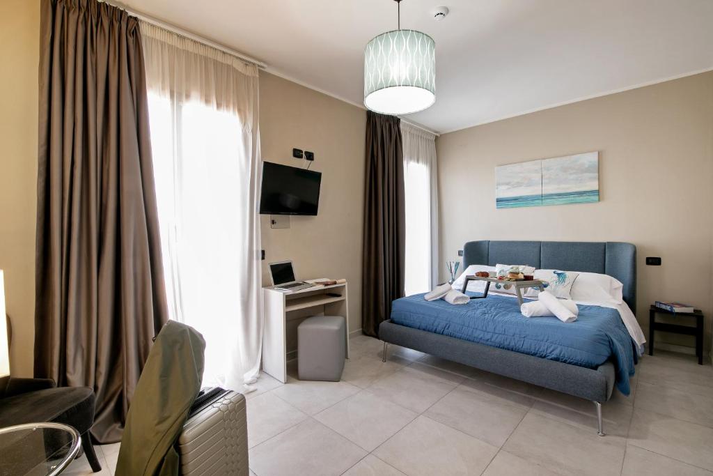 Postel nebo postele na pokoji v ubytování Hotel Noah
