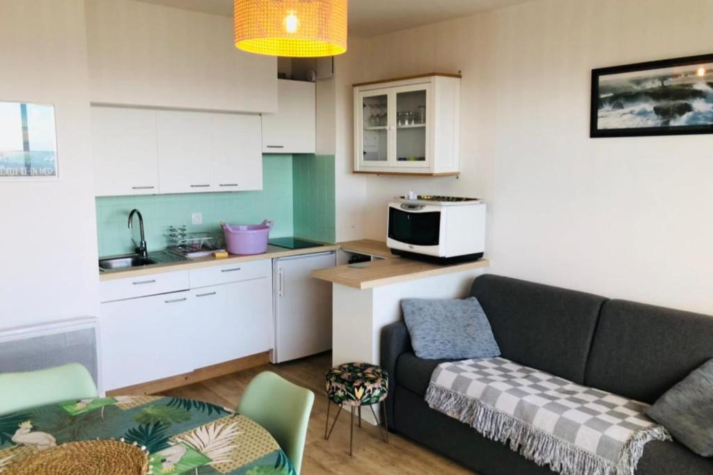 Kuchyň nebo kuchyňský kout v ubytování Appartement vue belle iles résidence clipper