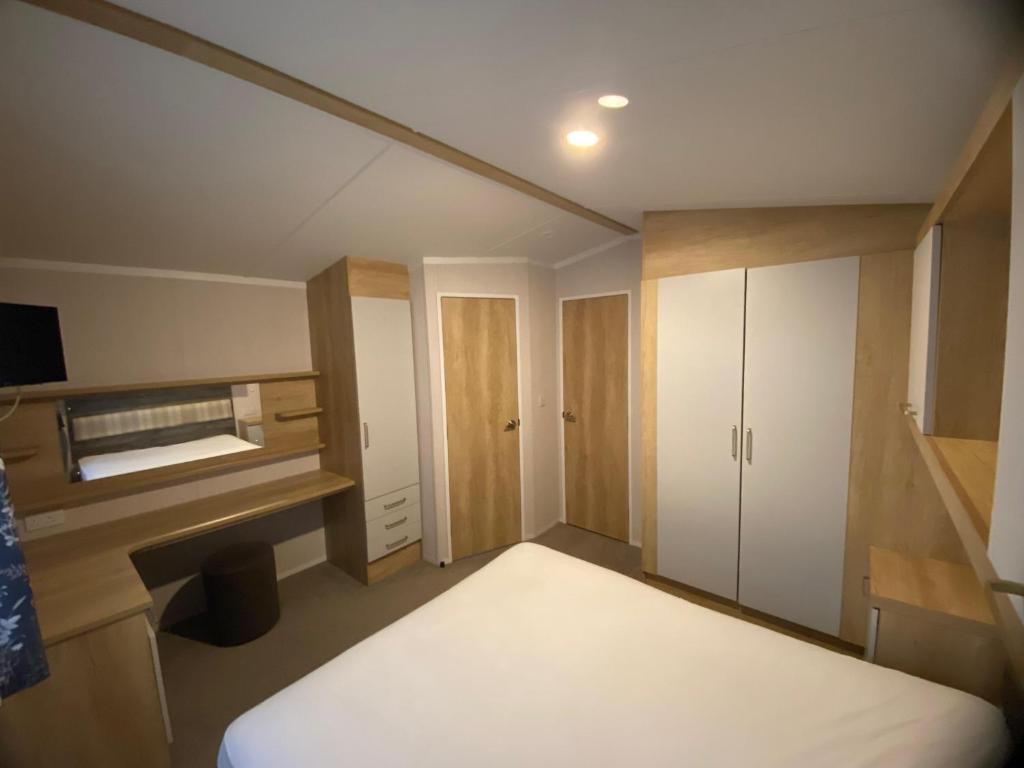 Postel nebo postele na pokoji v ubytování Thameside Sleep 6