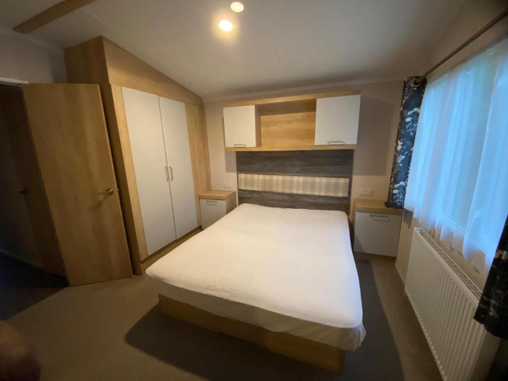 Postel nebo postele na pokoji v ubytování Thameside Sleep 6