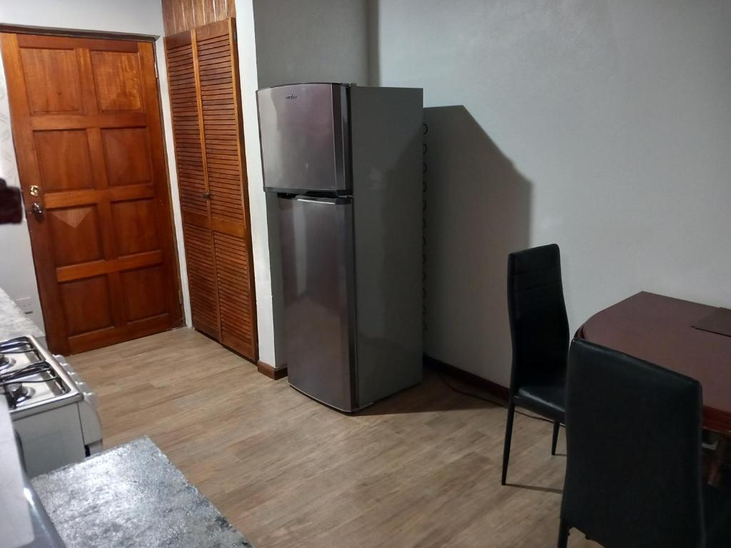 Kuchyň nebo kuchyňský kout v ubytování Habitat Apartments