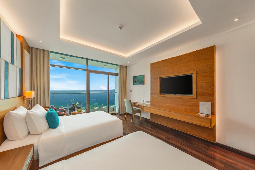 Phòng Deluxe 2 Giường Đơn Với Ban Công Và Tầm Nhìn Ra Đại Dương