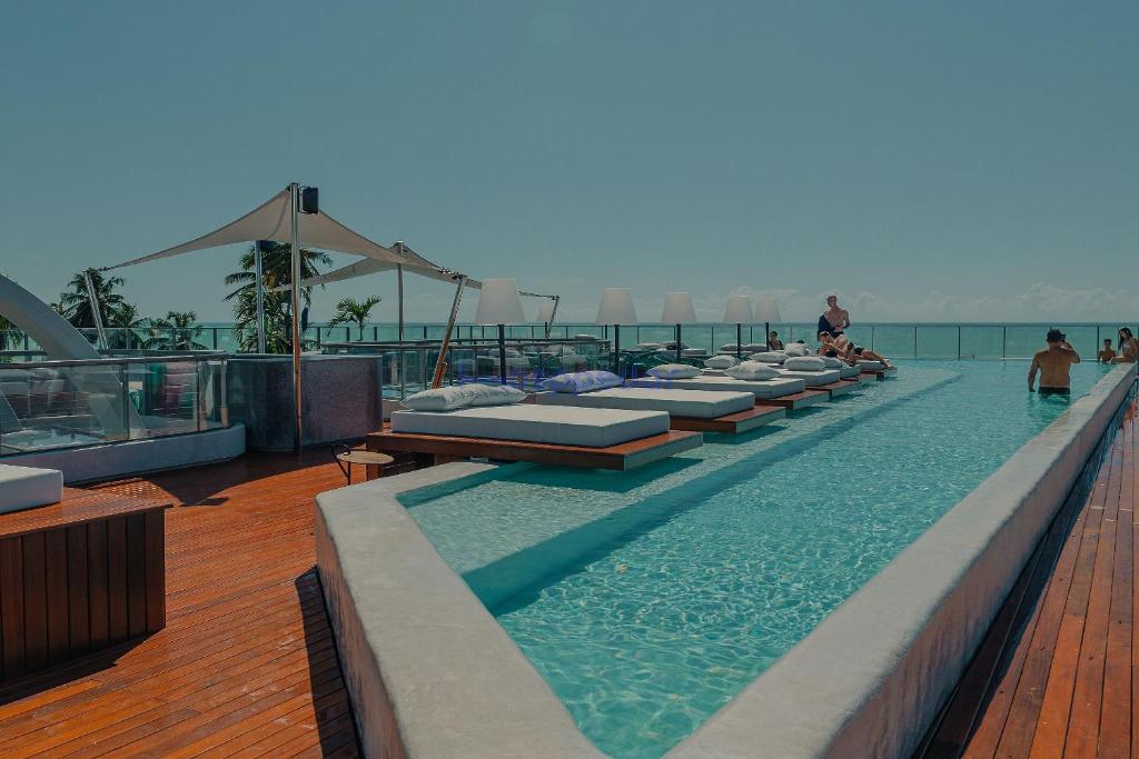 a pool on the top of a cruise ship at Yacht by Hosppedar in João Pessoa
