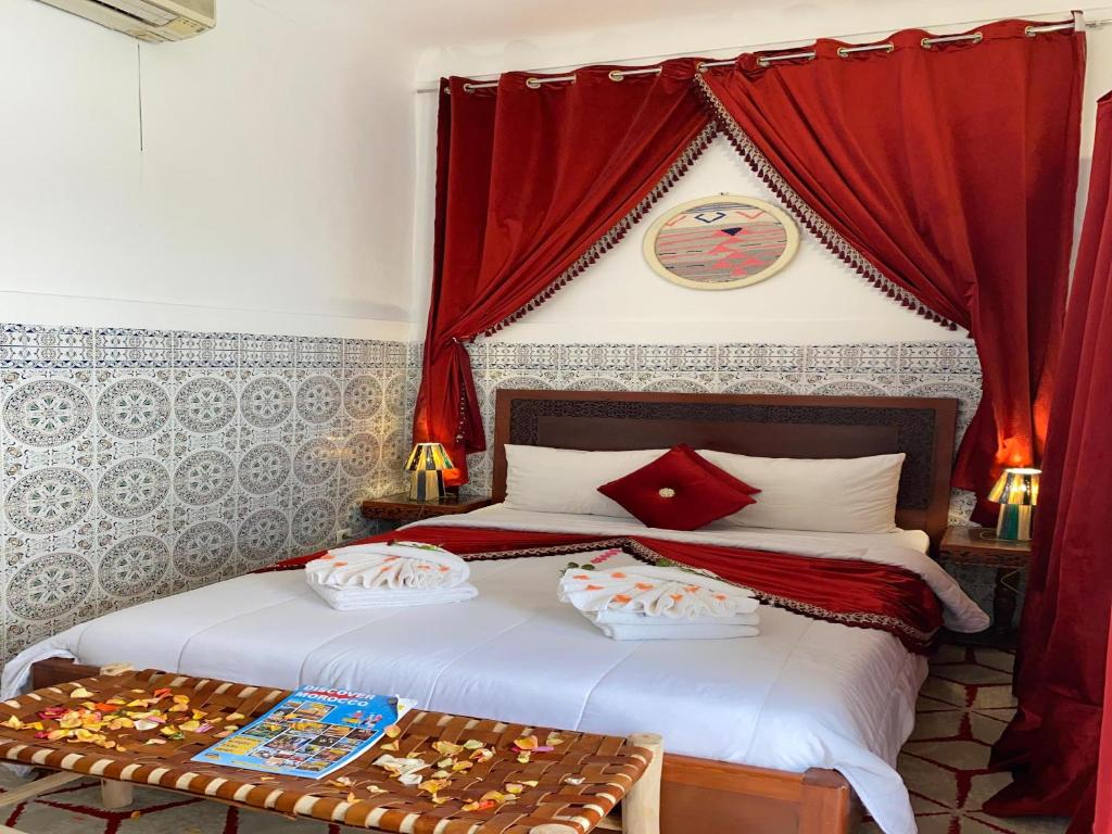 Postel nebo postele na pokoji v ubytování Riad Lazord