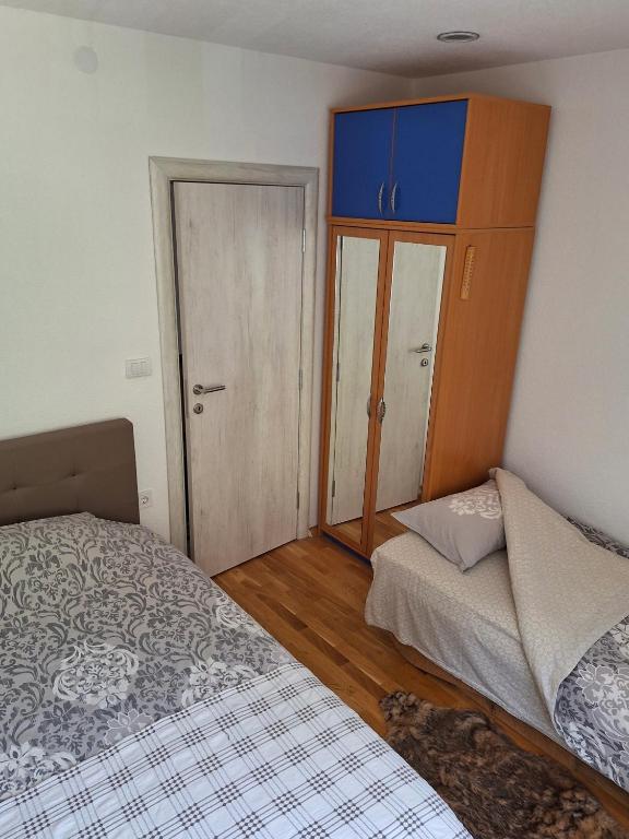Postel nebo postele na pokoji v ubytování Guest house Adžić