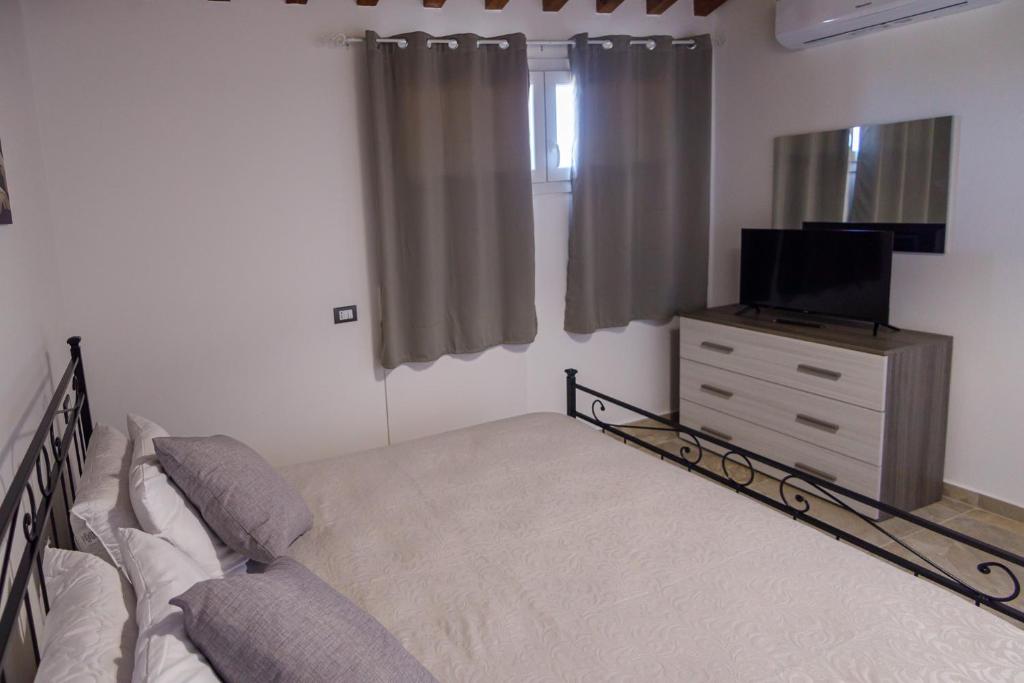 Postel nebo postele na pokoji v ubytování Borgo Felice