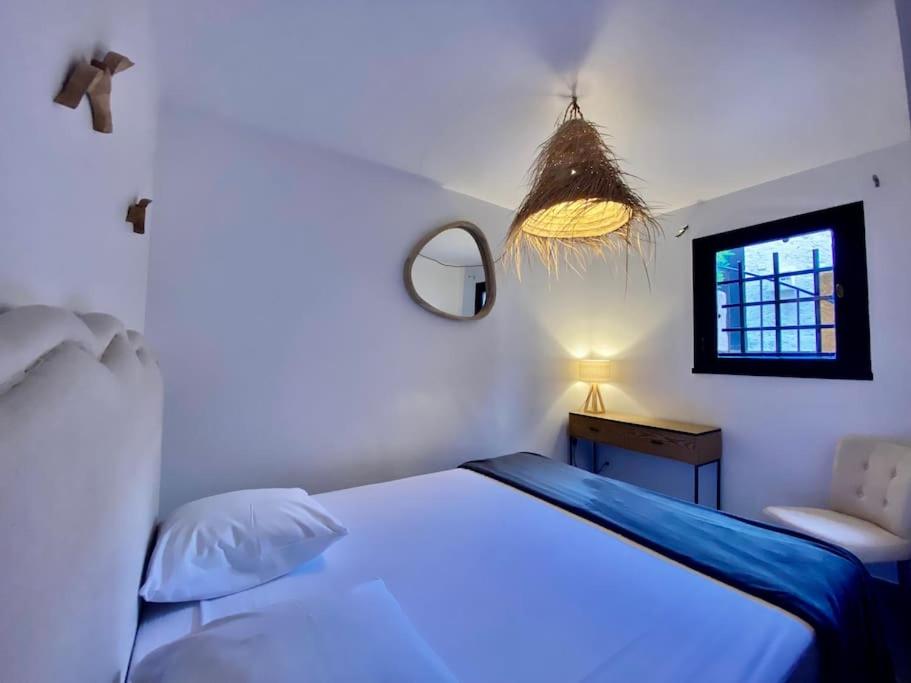 Postel nebo postele na pokoji v ubytování MarinesAppartement, La marina Tropézienne