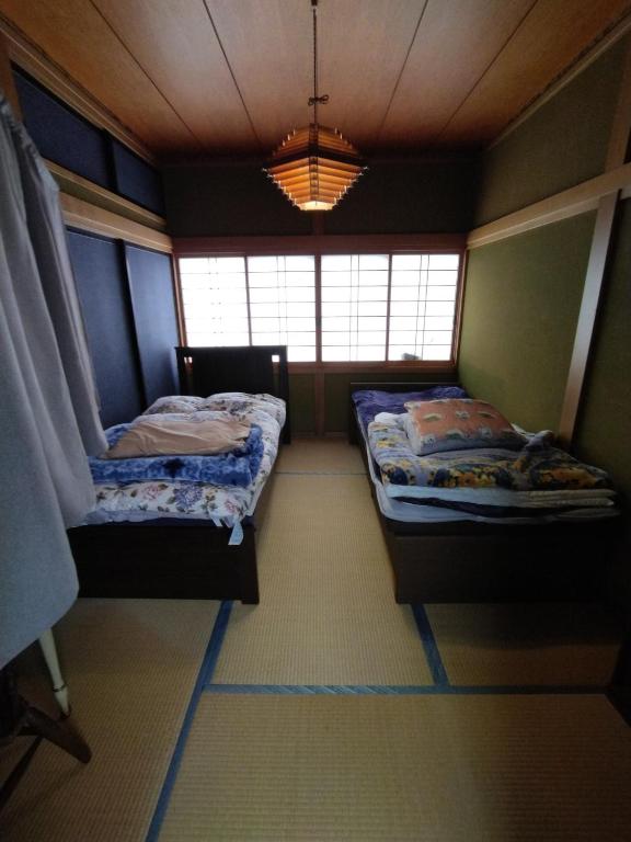 Giường trong phòng chung tại Ishinomaki - House - Vacation STAY 17245
