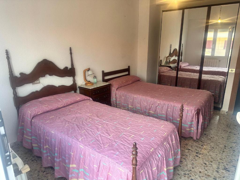 Postel nebo postele na pokoji v ubytování Casa javi etxea
