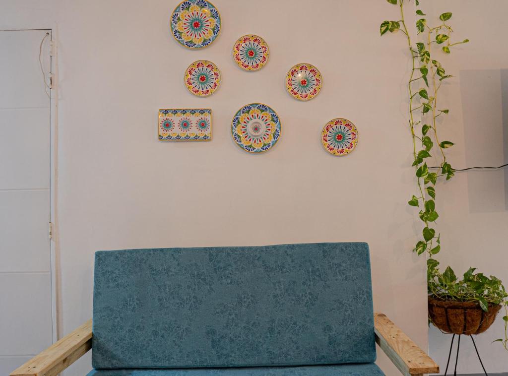 Posezení v ubytování Laureles Garden Hostel